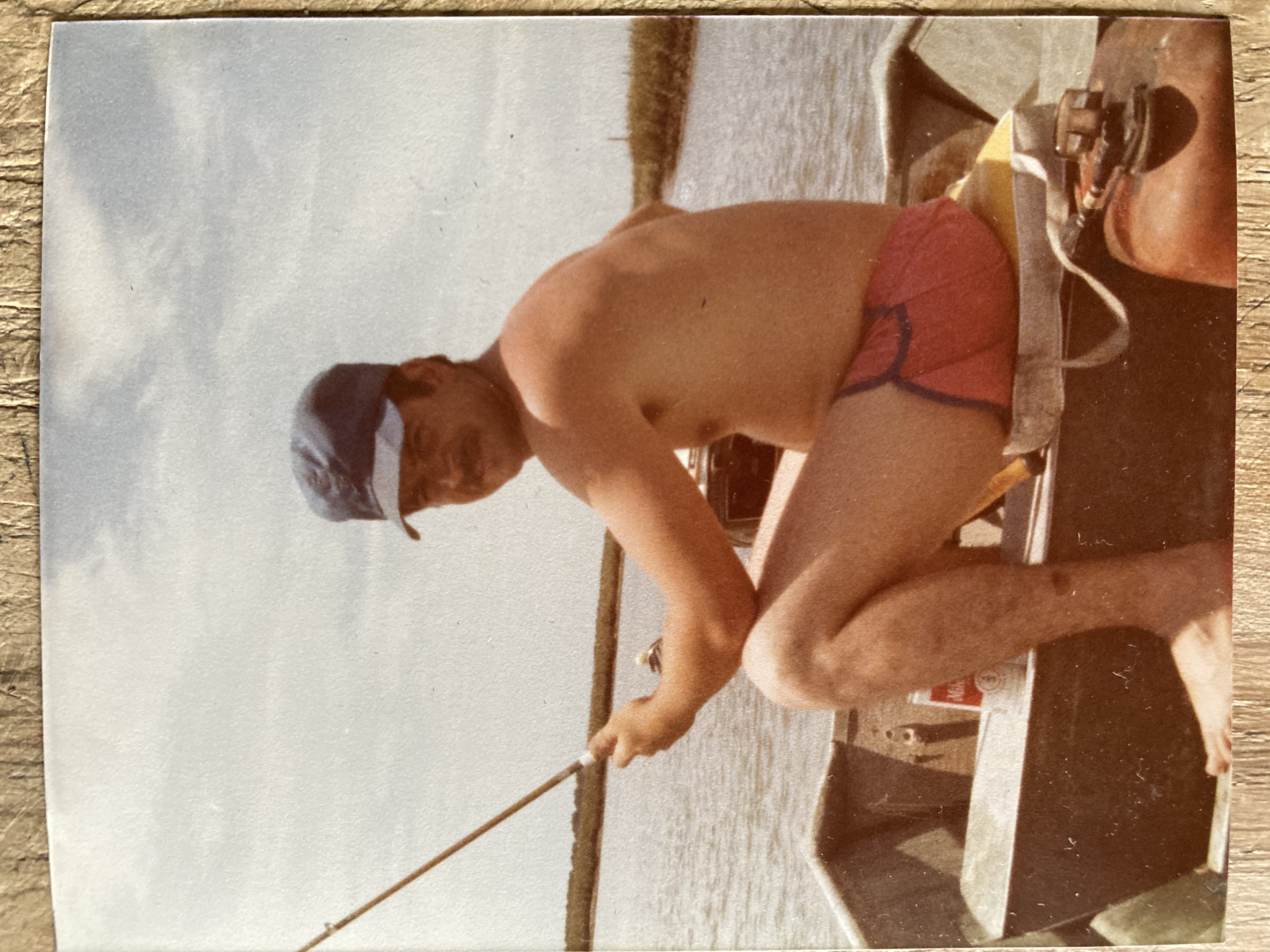 Gil Adams fishing from a boat